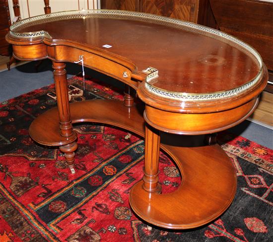 A mahogany kidney-shaped two-tier table W.105cm